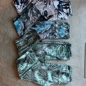 EUC multiple leggings 4 total. Tropical theme.size Medium
